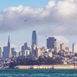Beautiful panoramic view of San Francisco skyline with landmarks across the bay.